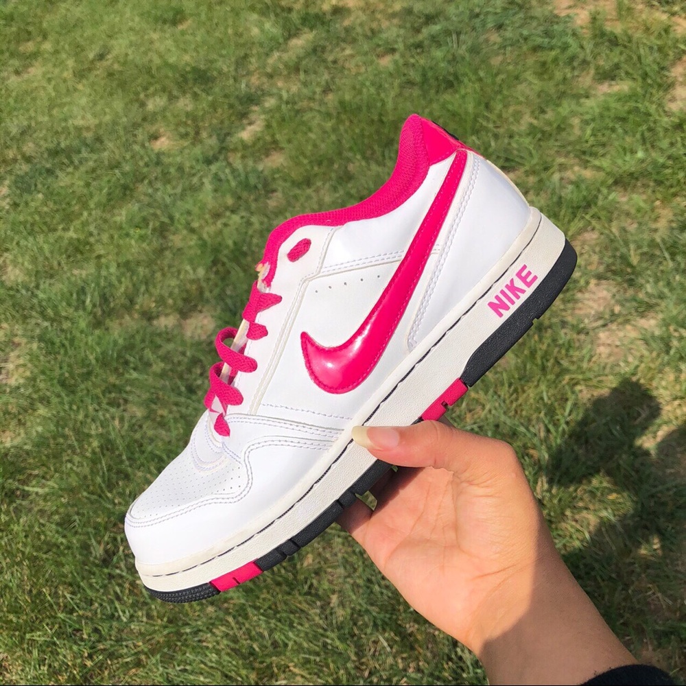 Pink and white Nike dunk low prestige air